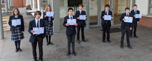 Students with their certificates